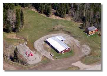 Bearberry Community Ground. Picture is courtesy of Petro Canada. It shows the Heritage & Arts Centre, Community Hall, Playground and Campground